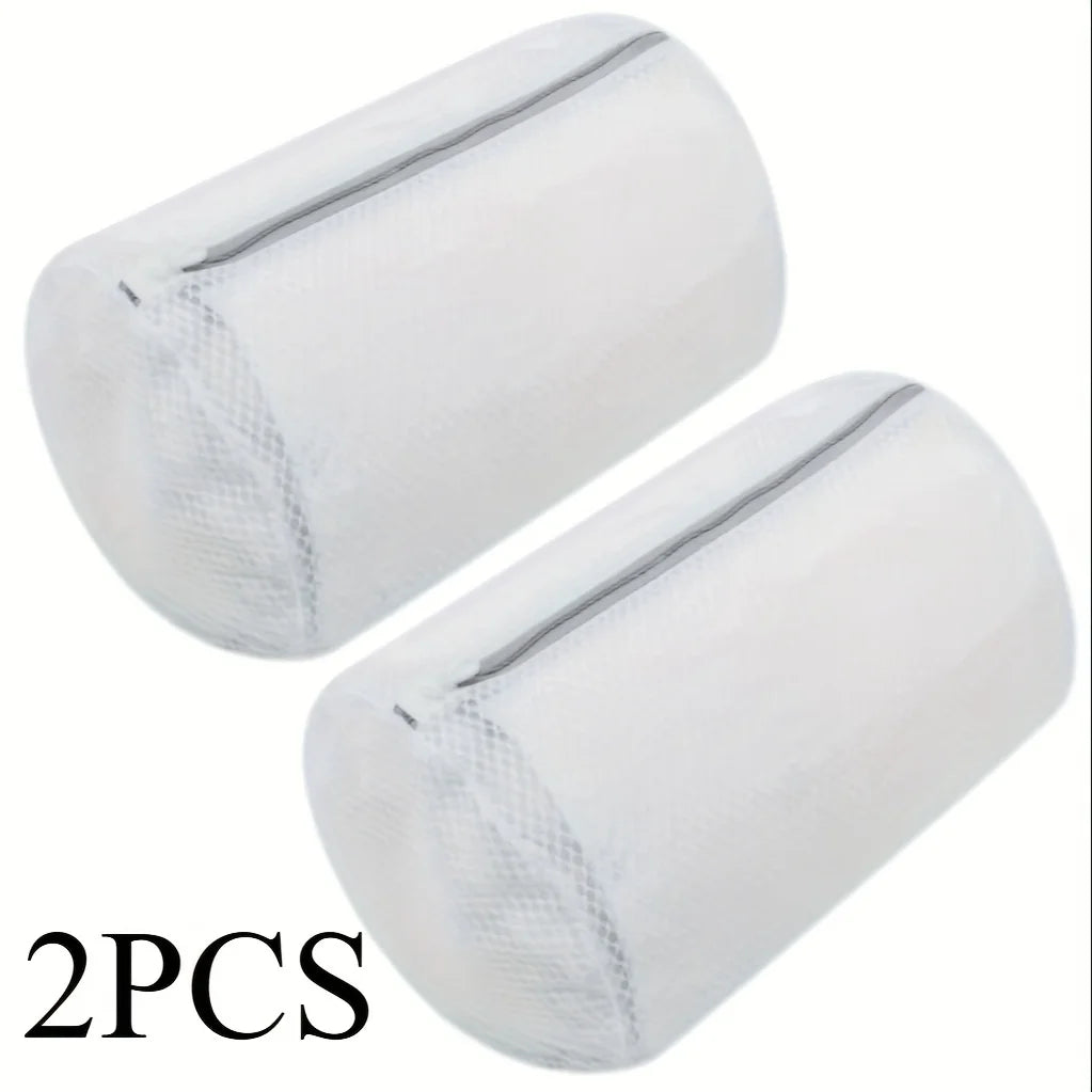 Two white mesh shoe washing bags with zipper closures