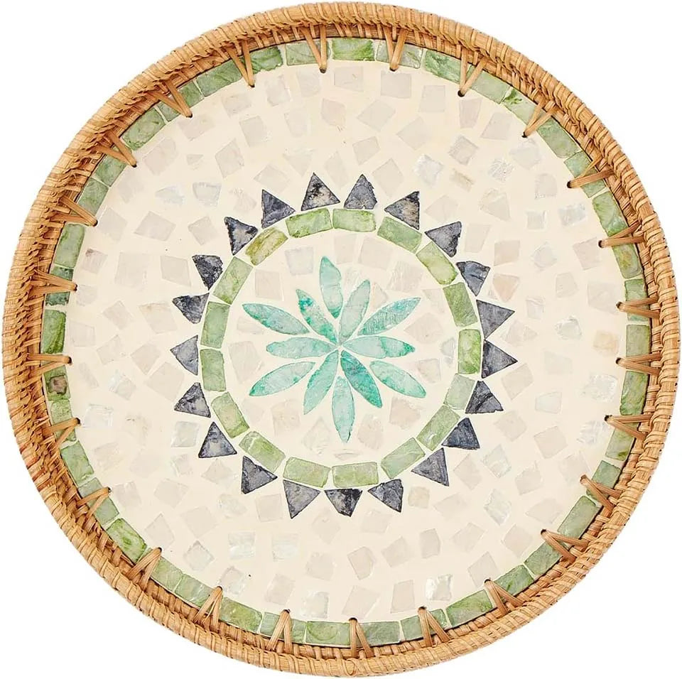 Handcrafted rattan serving tray with mother of pearl inlay featuring a geometric pattern.