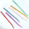 A collection of 20 large eye tapestry needles in various colors including green, yellow, and purple.