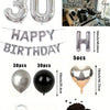 A kit featuring silver foil numbers, balloons, and a heart-shaped balloon for birthday decorations.