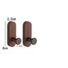 A pair of dark brown walnut wood hooks with round black mounting plates and a 2.5cm length.