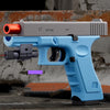 A light blue toy pistol with a grey barrel and magazine is shown against a textured background.