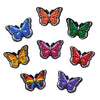 A set of colorful butterfly PVC pins used for decorating shoes and accessories.