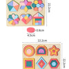 A wooden puzzle board featuring various colorful geometric shapes and patterns for children.