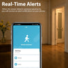 A smartphone screen showing a motion detection alert with the text Motion detected and options to Record or Smart.