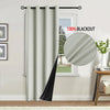 A white blackout curtain hanging on a rod next to a window, with a circular inset showing the fabric texture.