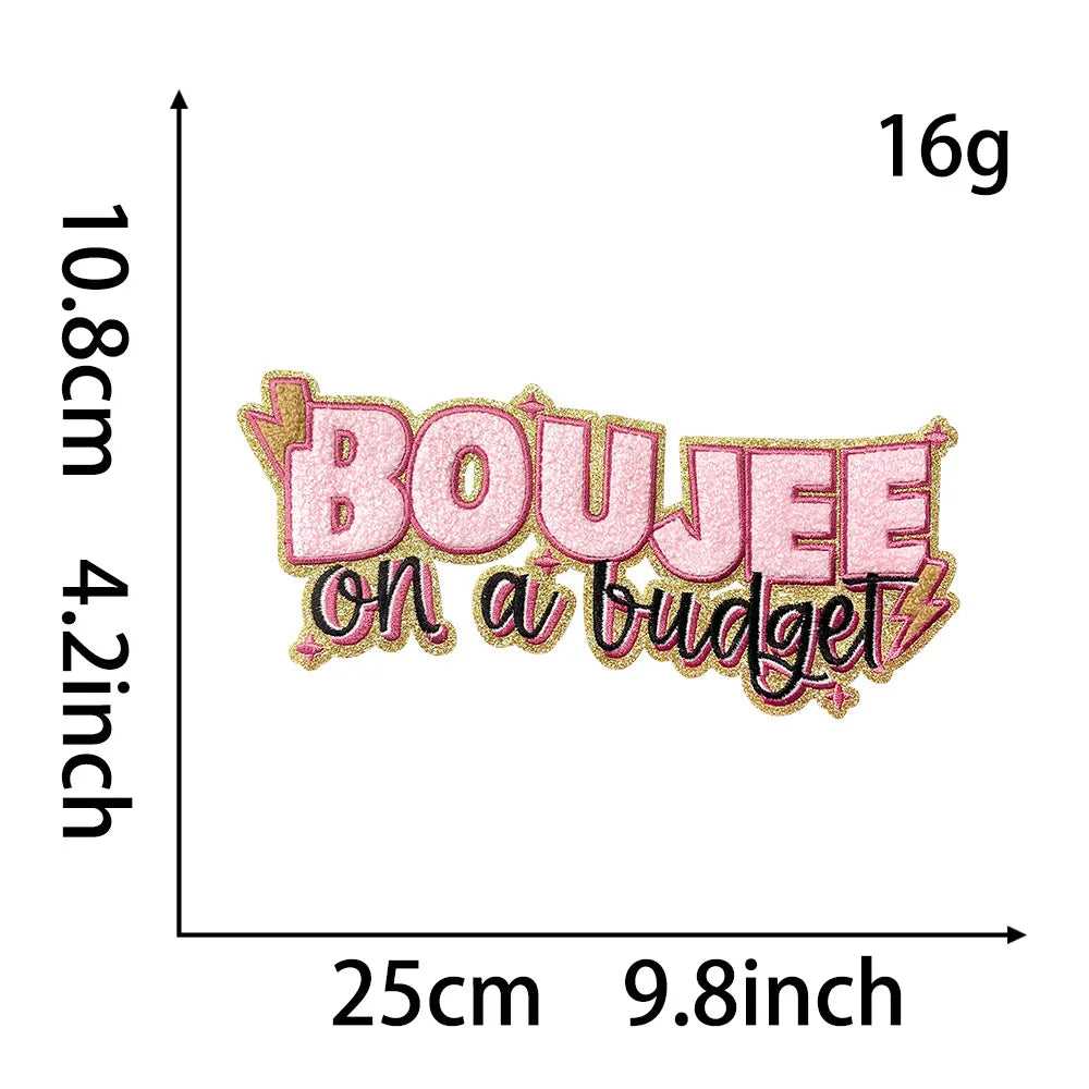 Pink embroidered patch with the text BOUJEE on a budget