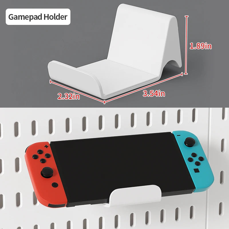 A white gamepad holder is shown next to a black tablet, demonstrating its use as a desktop organizer.