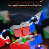 A colorful magnetic cube being manipulated by a hand, showing intense light effects against a dark background.