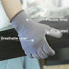 A hand wearing a gray PU-coated work glove is shown resting on a dark surface, highlighting the flexible wrist and breathable