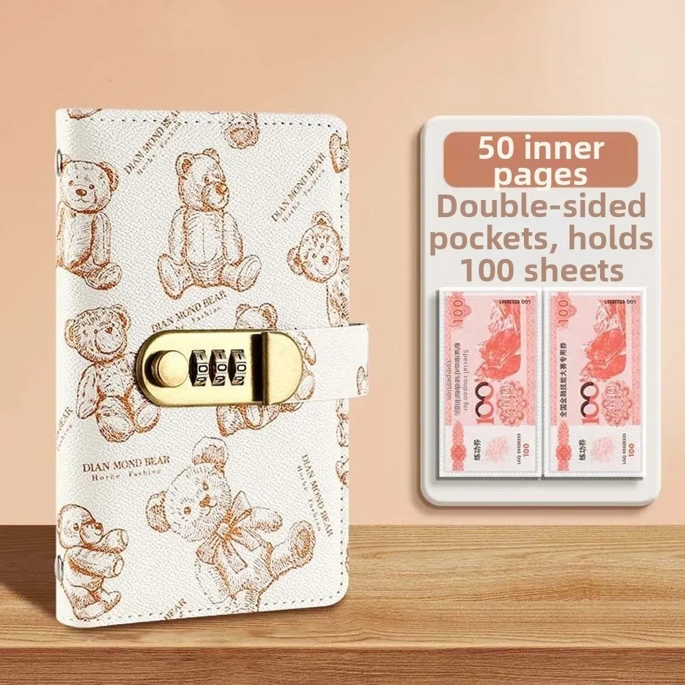 A beige notebook with a bear design and a gold lockable closure, next to a card holder displaying 50 inner pages.