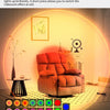 A red armchair is illuminated by a rainbow gradient light effect in a room, with a grid of colored lights on the floor.