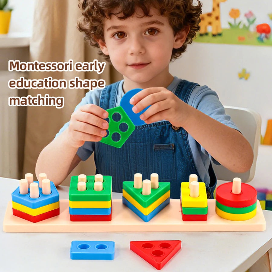A young boy is holding and interacting with a set of Montessori early education shape matching blocks.