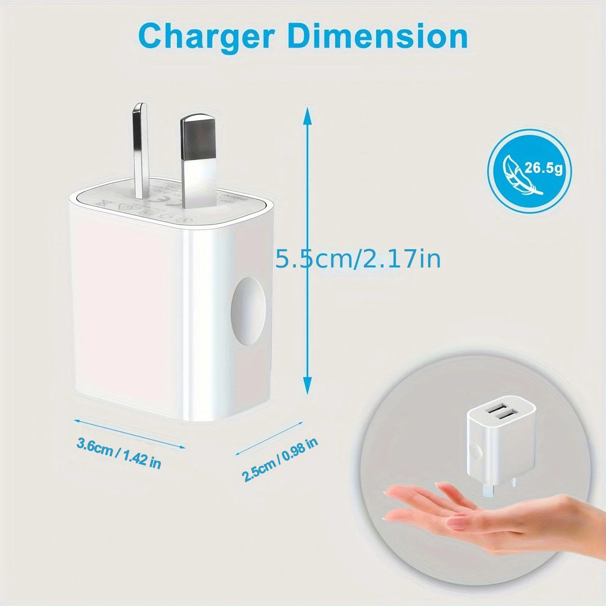 Diagram showing the dimensions of a compact dual-port USB wall charger and its size relative to a hand.