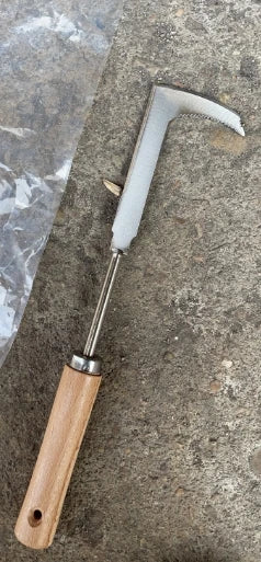 A carbon steel manual weeding tool set featuring a sickle, weeder, and hand shovel resting on a gray stone surface.