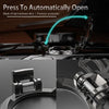 Close-up view of a metal push-start ignition button cover designed to automatically open.