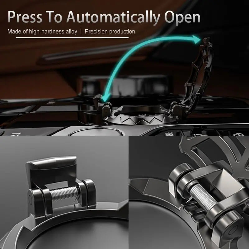 Close-up view of a metal push-start ignition button cover designed to automatically open.
