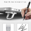 A silver aluminum portable laptop stand is shown next to a pen, demonstrating its light weight and design.