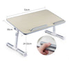 An adjustable foldable laptop desk with a light wood-colored surface and silver metal frame.
