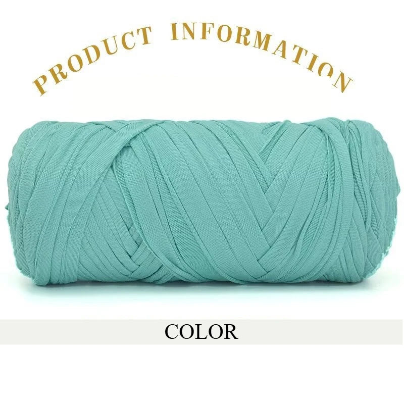 A skein of teal green thick polyester blend yarn for knitting and crochet.