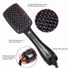 A black hot air brush dryer and styler with a large paddle design and anti-skid handle.