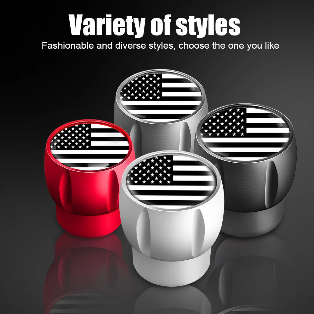 A set of four tire valve caps featuring the American flag design in red, black, and white.