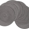 A stack of six gray braided round placemats.