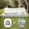Instant pop-up mosquito net for a single bed shown spread out on grass with a tent in the background
