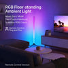 An RGB floor-standing ambient light illuminates a living room, displaying various colors and features.
