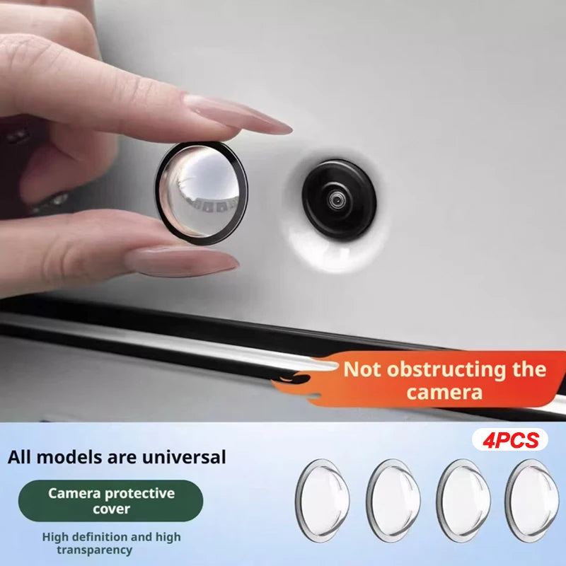 A hand is shown placing a clear protective cover onto a camera lens on a vehicle's rear view backup camera.