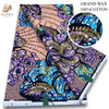Pink glitter African wax print fabric featuring purple, blue, and gold floral patterns
