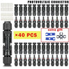 A set of black photovoltaic connectors and cable assembly components for solar panel wiring.