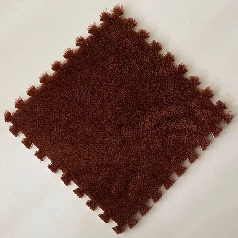 A square piece of dark brown, textured plush material used as an interlocking floor tile.