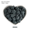 A pile of dim gray silicone crown star heart beads for DIY jewelry making