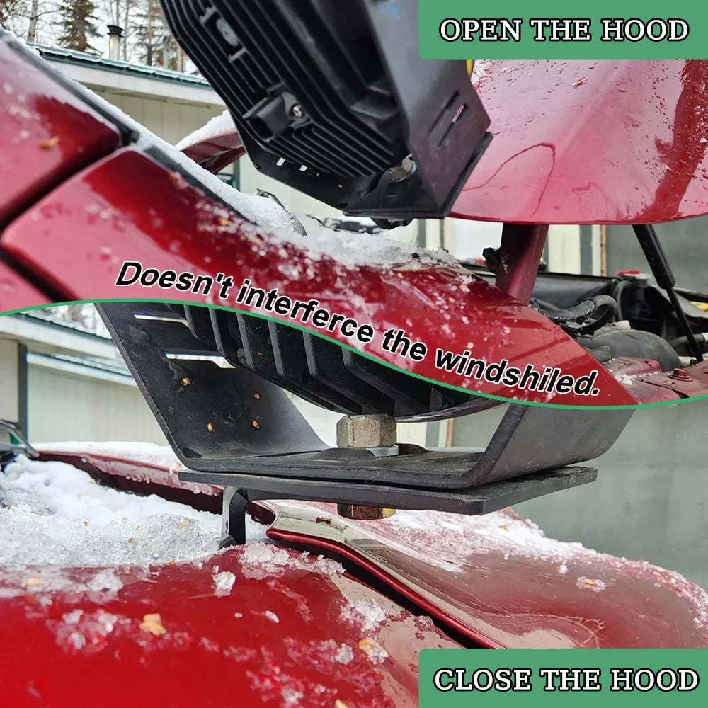 Close up view of a red Dodge Ram hood with LED light mounting brackets and antenna mount components.