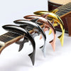 A set of five shark-design guitar caps with zinc alloy build in various colors including black, silver, rose gold, and gold.