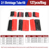 A set of heat shrink tubing kits showing various lengths and colors of black and red tubing.