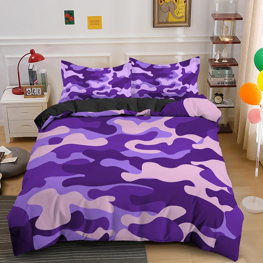 Purple and pink camouflage duvet cover set displayed on a bed with white bedside tables.