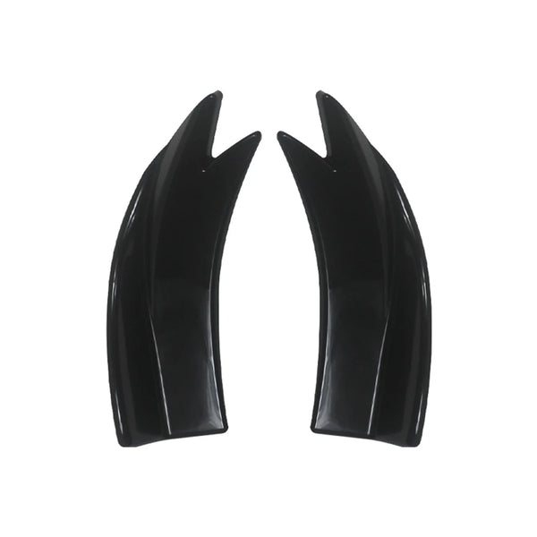 A pair of black universal car rear bumper splitters with a carbon fiber finish.