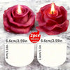 Deux moules en silicone rouge foncé en forme de roses pour cire de bougie