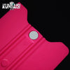 A close-up view of a pink magnetic suede edge squeegee tool for vinyl wrap and window tinting.