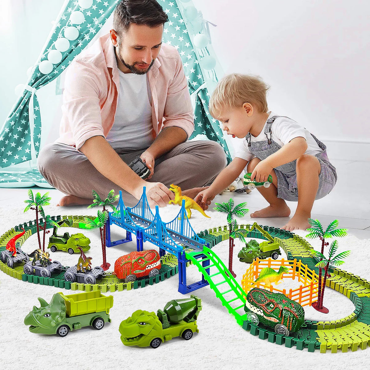 A boy is playing with a dinosaur adventure climbing race track toy set featuring various vehicles and jungle scenery.