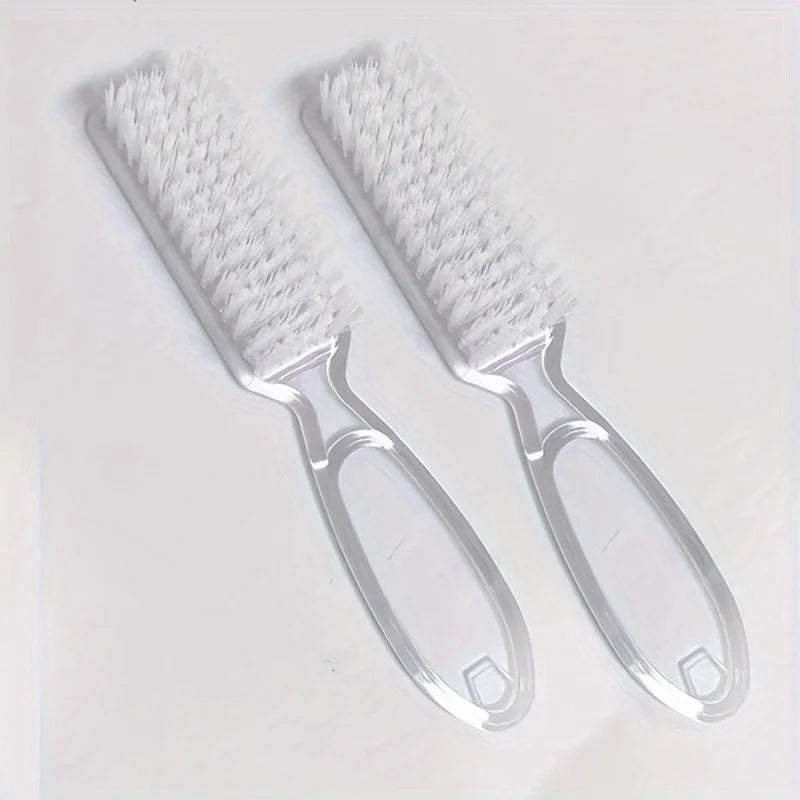 A pair of white nail art brushes with long clear handles are shown against a white background.