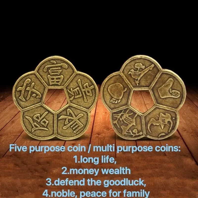 Five purpose coins made of brass with traditional Chinese characters for luck and wealth