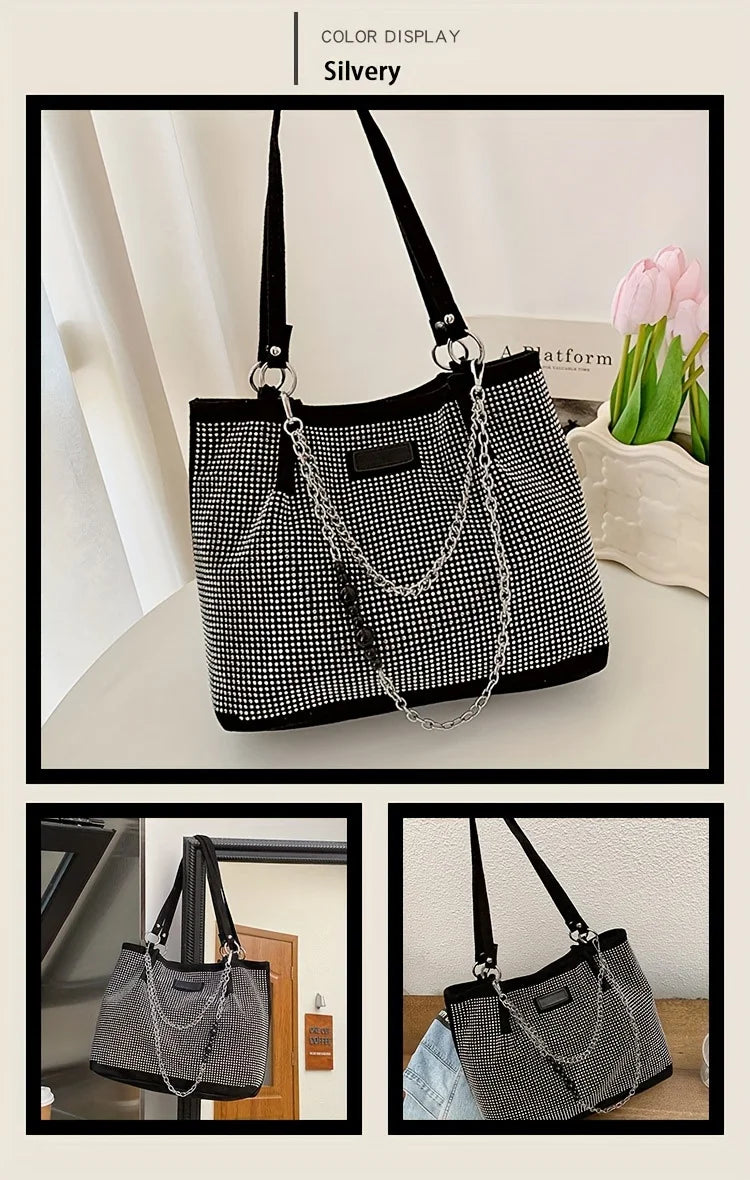 Silver crystal-embellished chain shoulder bag displayed on a white surface.