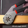 A close-up of a gray 6/8 inch magic wrench with a black and red handle resting on a wooden surface.