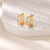 Boucles d'oreilles créoles en zircon cubique ton or