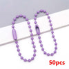 A string of purple ball beads is displayed on a white background, next to a packaged set of 50 pieces.