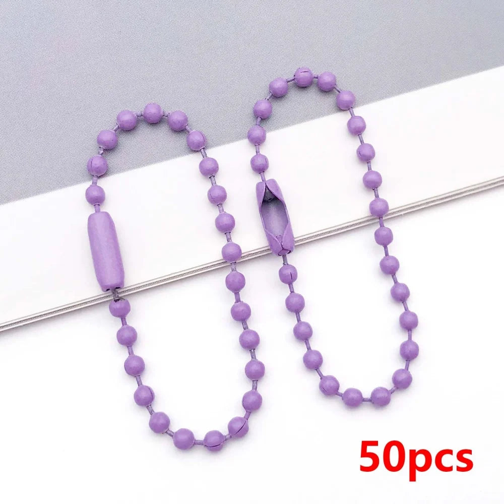 A string of purple ball beads is displayed on a white background, next to a packaged set of 50 pieces.