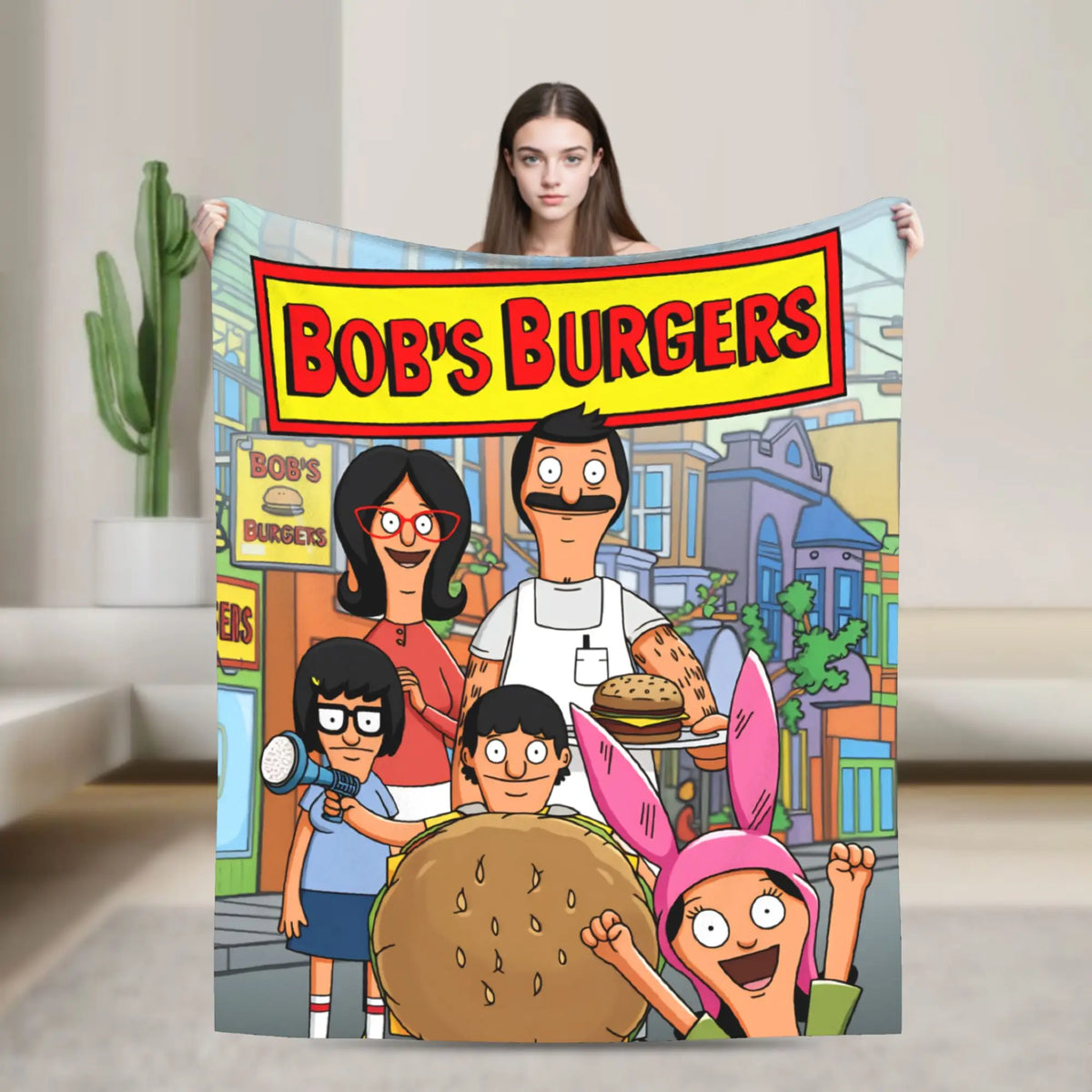 A colorful cartoon featuring characters from Bob's Burgers, including a woman and a man, on a throw blanket.
